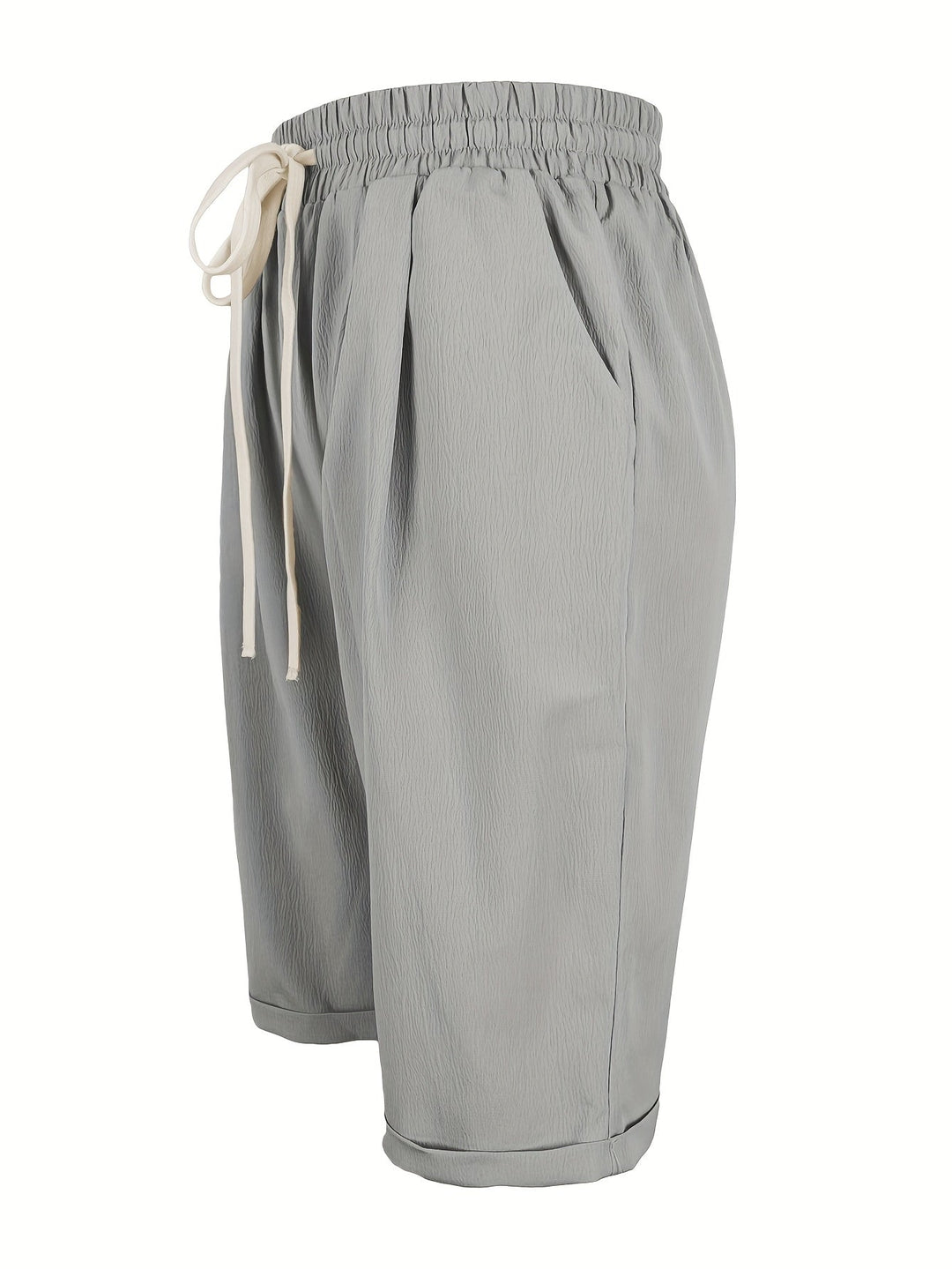 Modern women's straight leg cropped pull-on shorts, offering comfort and a chic relaxed summer look.
