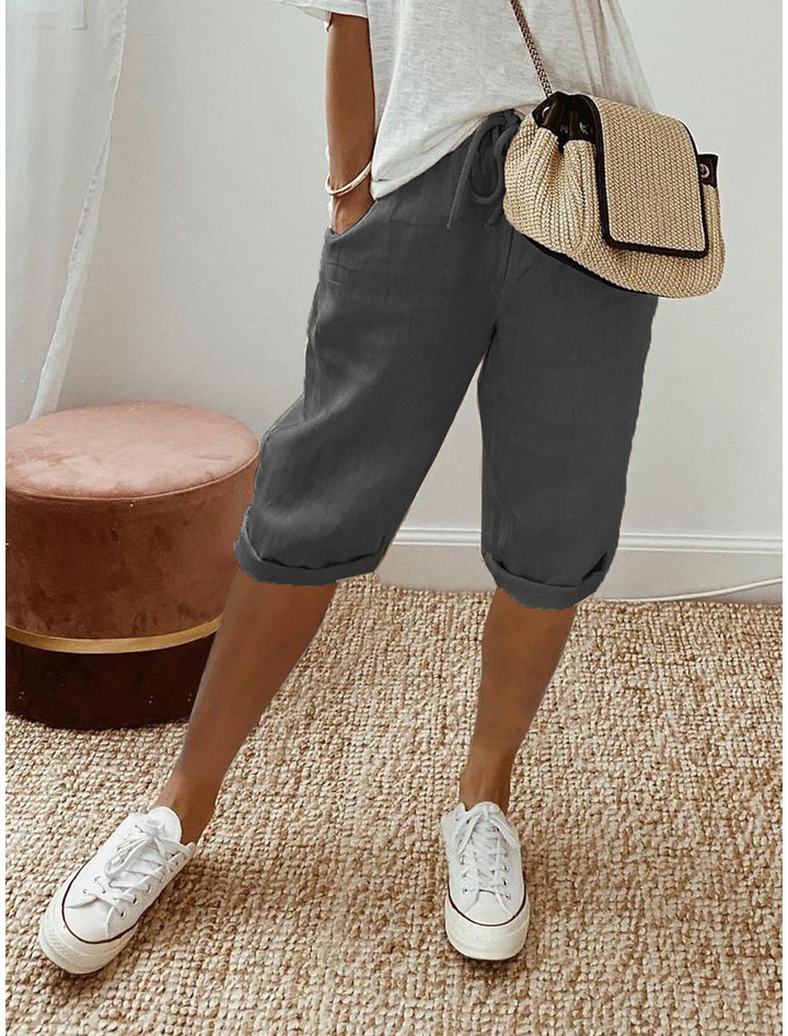 Women's elastic waist pull-on shorts with a comfortable straight leg crop, perfect for summer.
