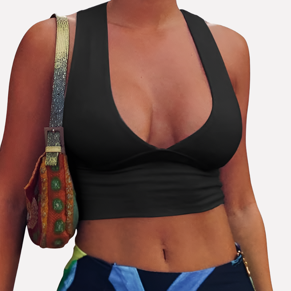 Trendy women's sleeveless crop top with racerback and cutout detail. Ideal deep V-neck for warm weather going out.