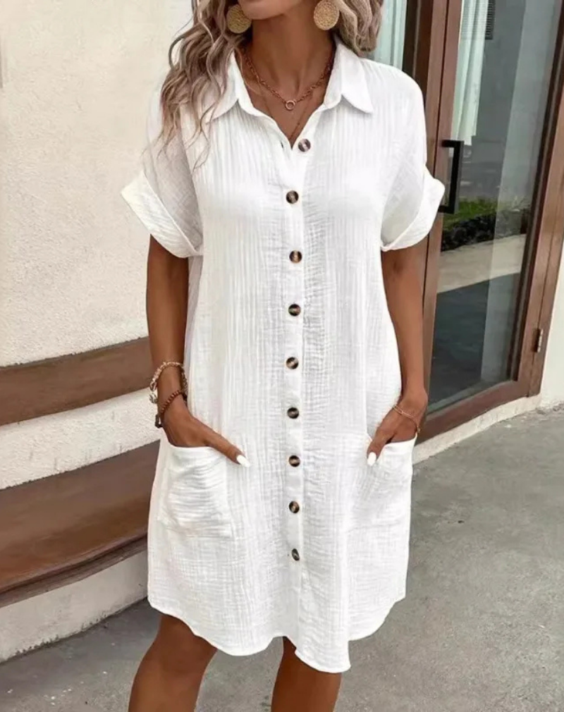 Women's relaxed button-down collared shirt dress, short sleeve mini for casual spring/summer wear.