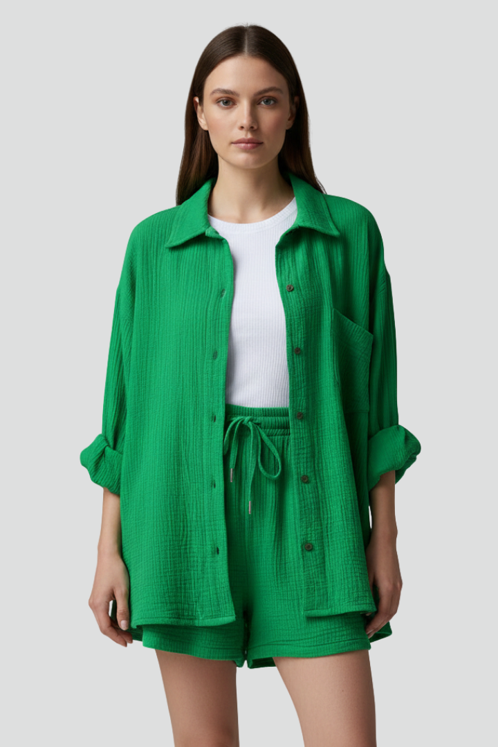 Stylish women's casual button-up shirt and drawstring shorts two-piece lounge set, perfect for summer comfort.
