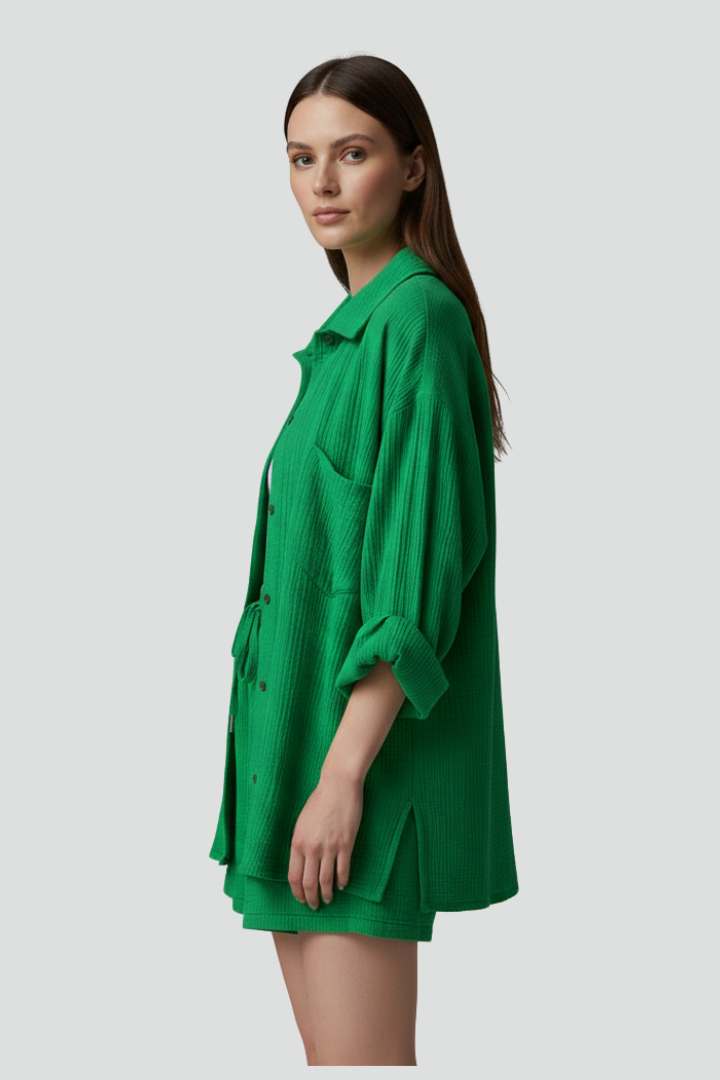 Chic women's relaxed button-up shirt & drawstring shorts lounge set, ideal for spring & summer comfort.