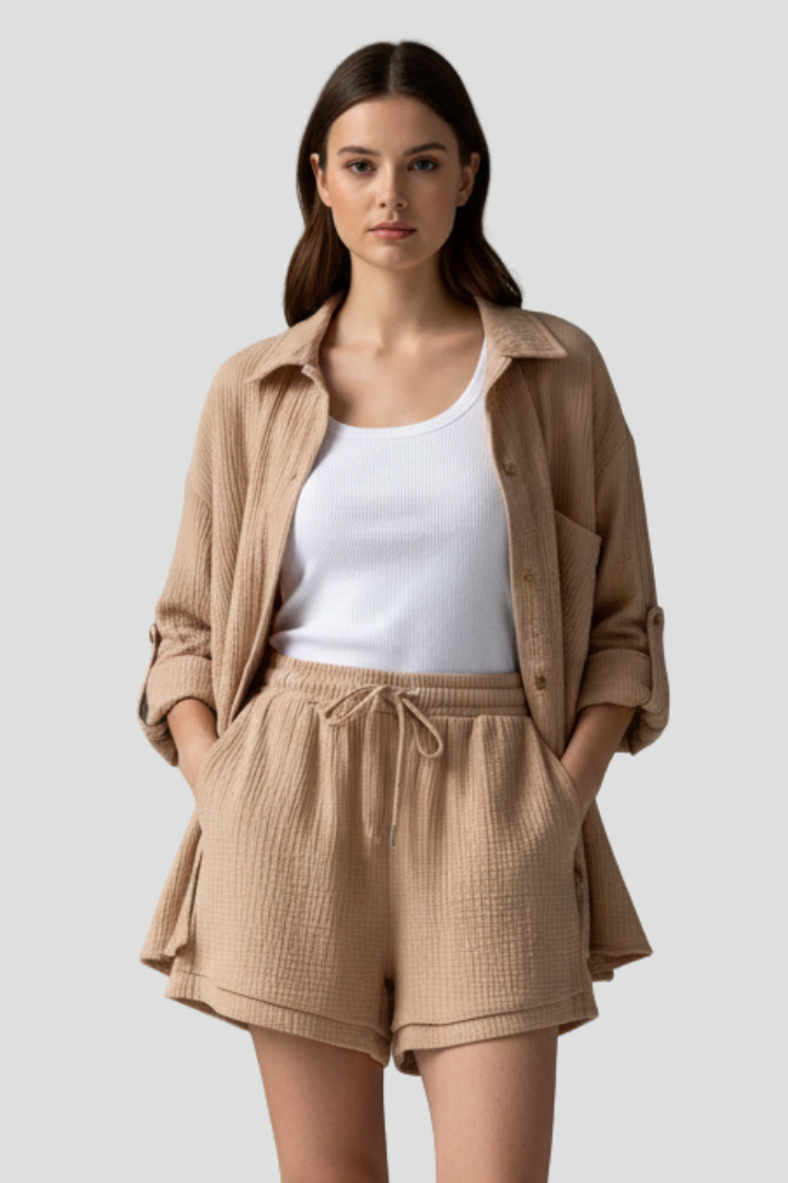 Versatile women's two-piece button-up shirt & drawstring shorts lounge set for everyday casual style.