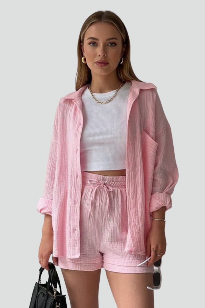 Women's casual two-piece lounge set: relaxed button-up shirt and drawstring shorts for summer everyday wear.