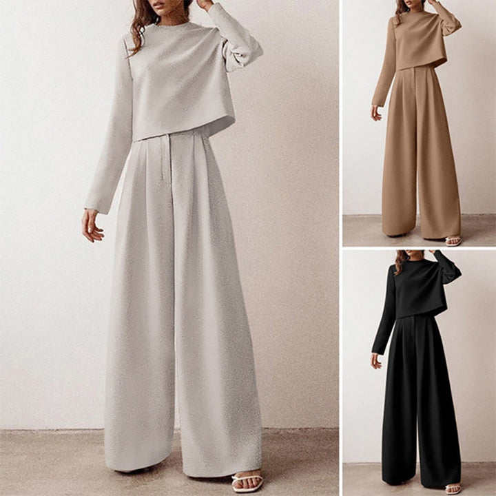 Women's summer outfit: a casual cropped top and flowy wide-leg trousers in a matching set.