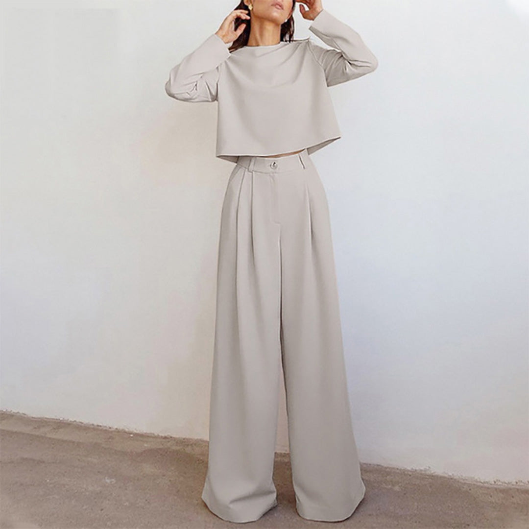 Fashionable women's relaxed fit cropped top and wide-leg trouser set for effortless style.