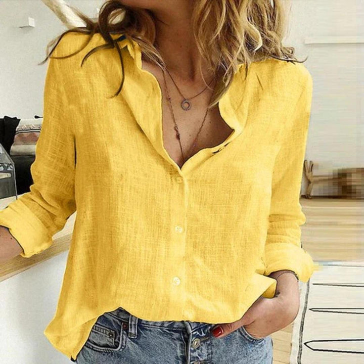 Women's relaxed fit bird print button-down blouse, perfect for casual spring fashion.
