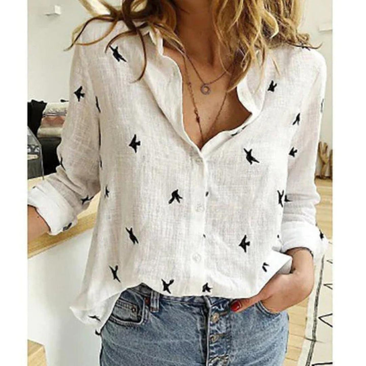 Chic casual women's blouse: relaxed fit, bird print, button-down, suitable for many occasions.