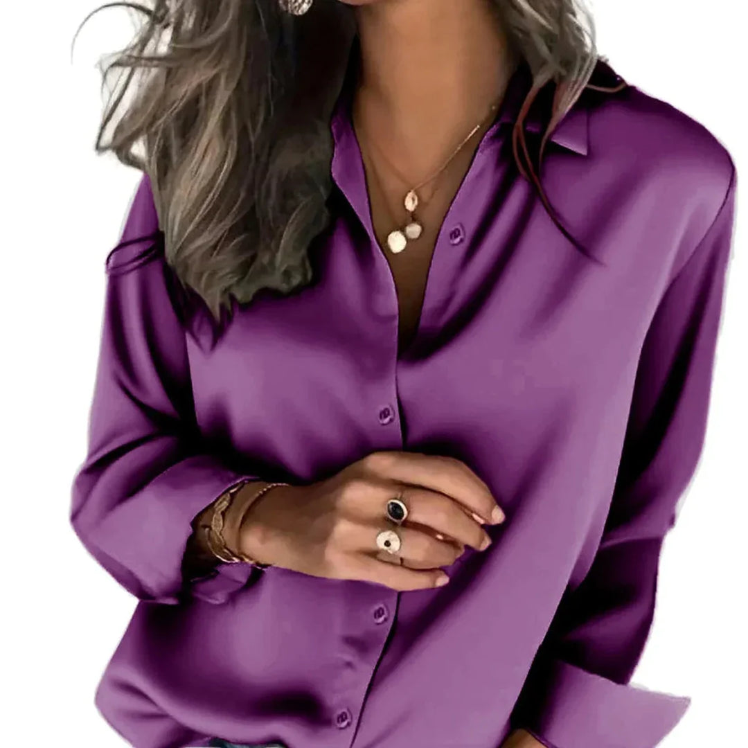 Women's relaxed fit button-down shirt, long sleeve, effortless everyday style, versatile casual wear.