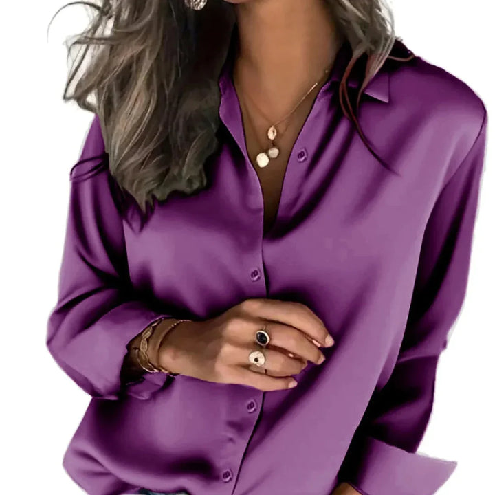 Women's relaxed fit button-down shirt, long sleeve, effortless everyday style, versatile casual wear.