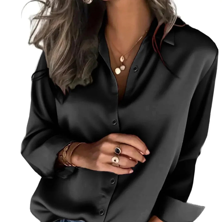 Model in white relaxed button-down shirt, long sleeve, perfect for casual everyday fashion.