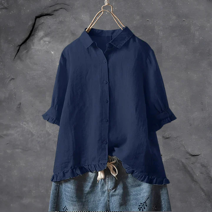 Versatile women's ruffle-trim short-sleeve button-down blouse. Elegant & relaxed fit for everyday summer wear.