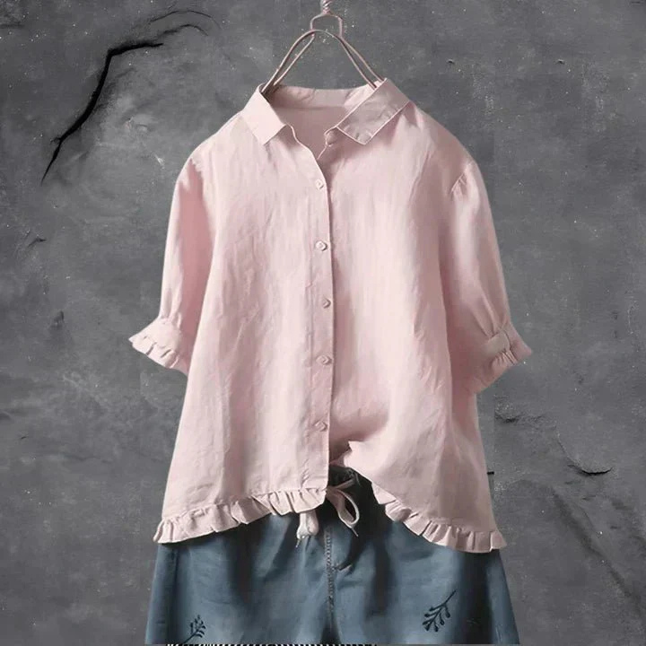 Comfortable women's relaxed fit button-down shirt. Stylish ruffle-trim short-sleeve top, ideal for summer casual wear.