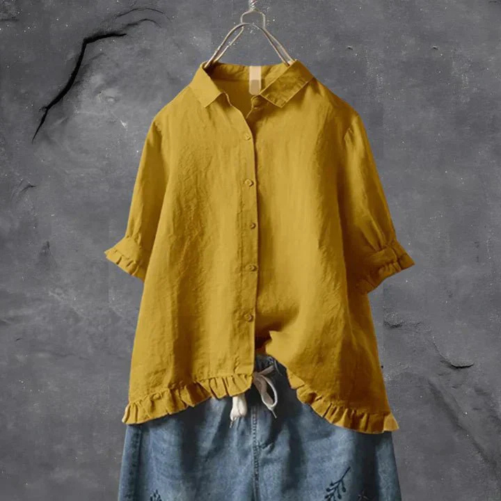 Women's chic ruffle-trim short-sleeve button-down shirt. A relaxed fit summer blouse for elegant everyday wear.