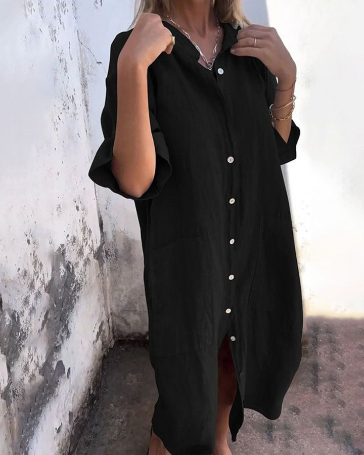 Comfortable women's short sleeve shirt dress with V-neck, button front & practical pockets for everyday.