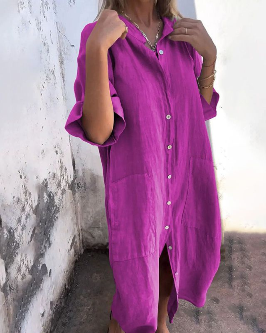 Everyday women's relaxed fit dress, a button-front shirt dress with short sleeves, V-neck, and practical pockets.