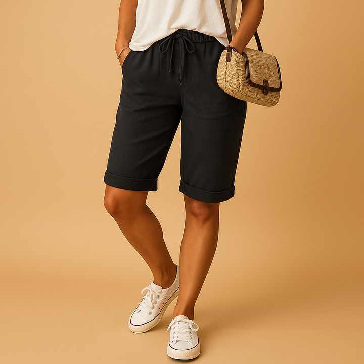 Women's relaxed fit capri pants with comfortable drawstring waist and stylish rolled hem, perfect for casual summer wear.