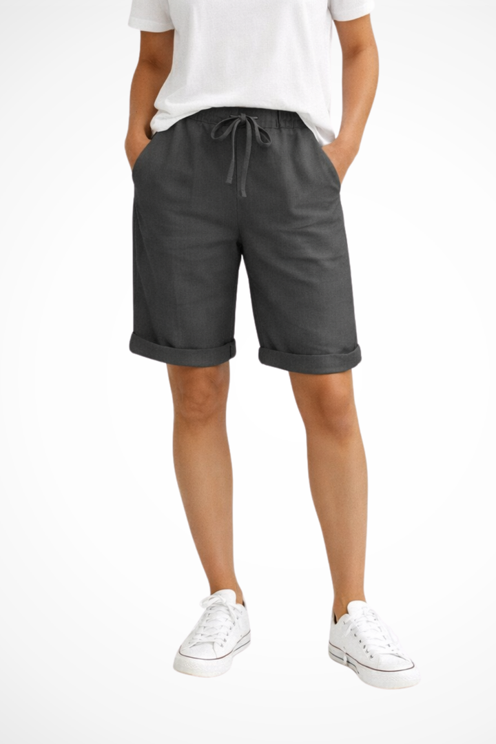 Stylish women's relaxed fit capri shorts with drawstring waist, ideal for comfortable everyday summer wear.