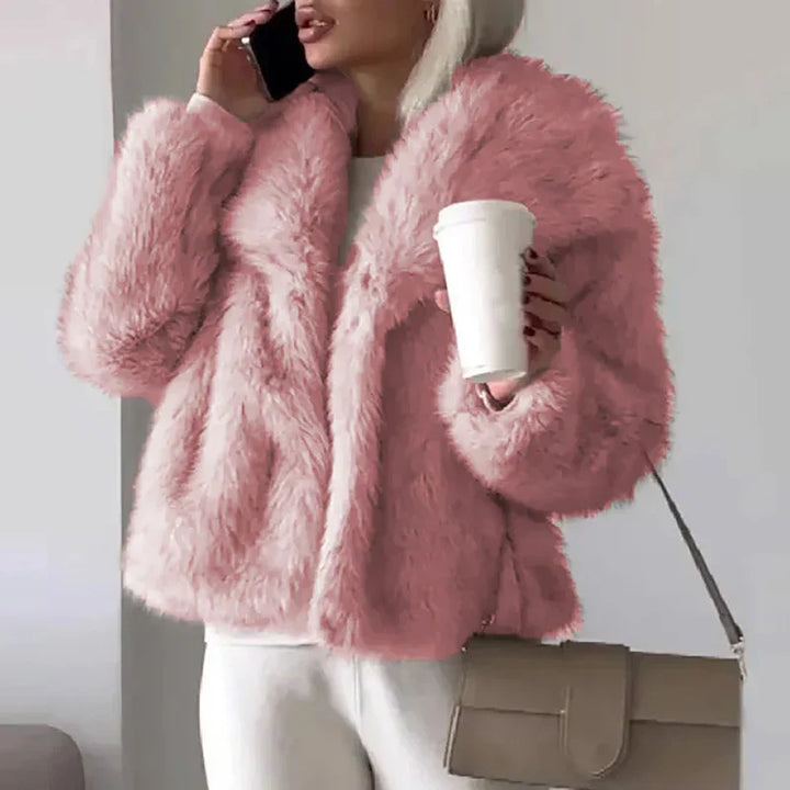 Women's relaxed fit elegant faux fur jacket in a neutral beige color, perfect for winter casual wear