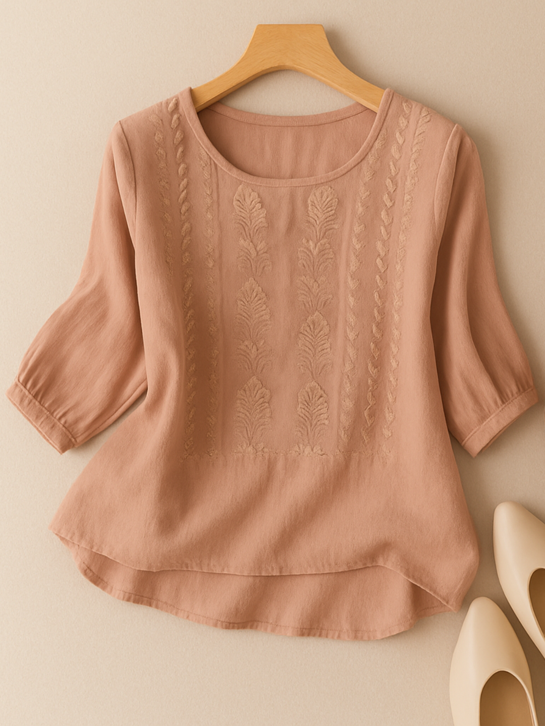 Elegant women's loose fit embroidered pullover blouse, ideal for everyday wear and effortless spring fashion.