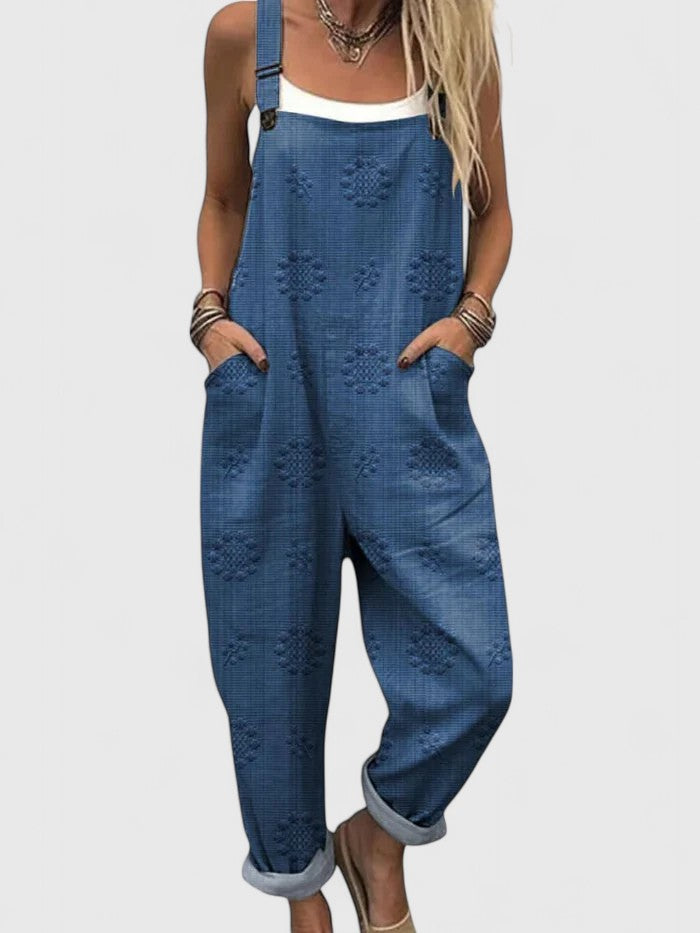 Women's relaxed fit floral embroidered jumpsuit with practical pockets. Perfect for casual summer fashion & boho style.