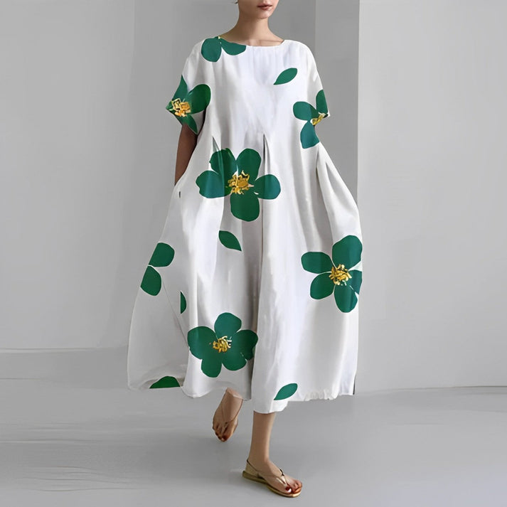 Women's relaxed fit floral midi dress, perfect for summer casual wear with a flowy silhouette.