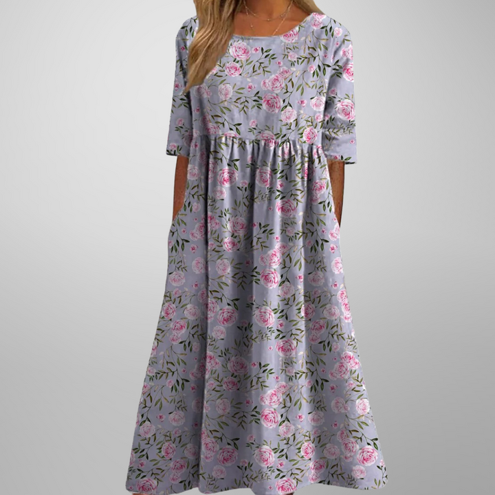 Effortless women's relaxed floral midi dress, a comfortable and stylish choice for any casual outing.