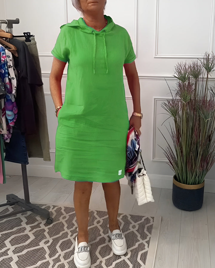 Chic women's relaxed fit midi dress, hoodie style, half sleeve, adjustable hood for casual wear.