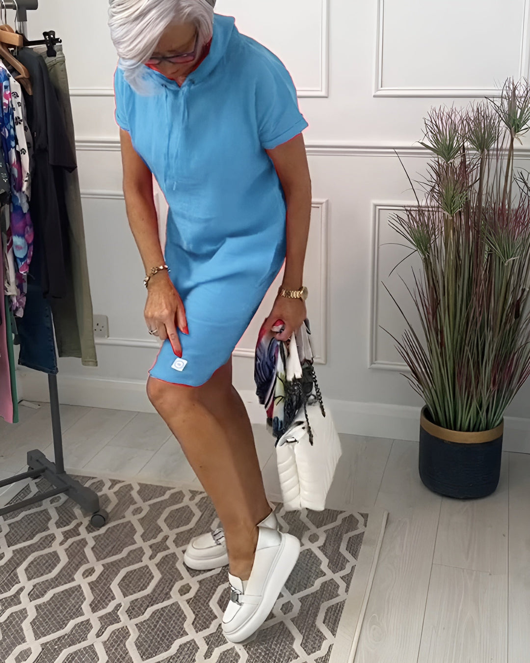 Half sleeve women's relaxed fit hoodie midi dress, ideal for comfortable spring and summer wear.