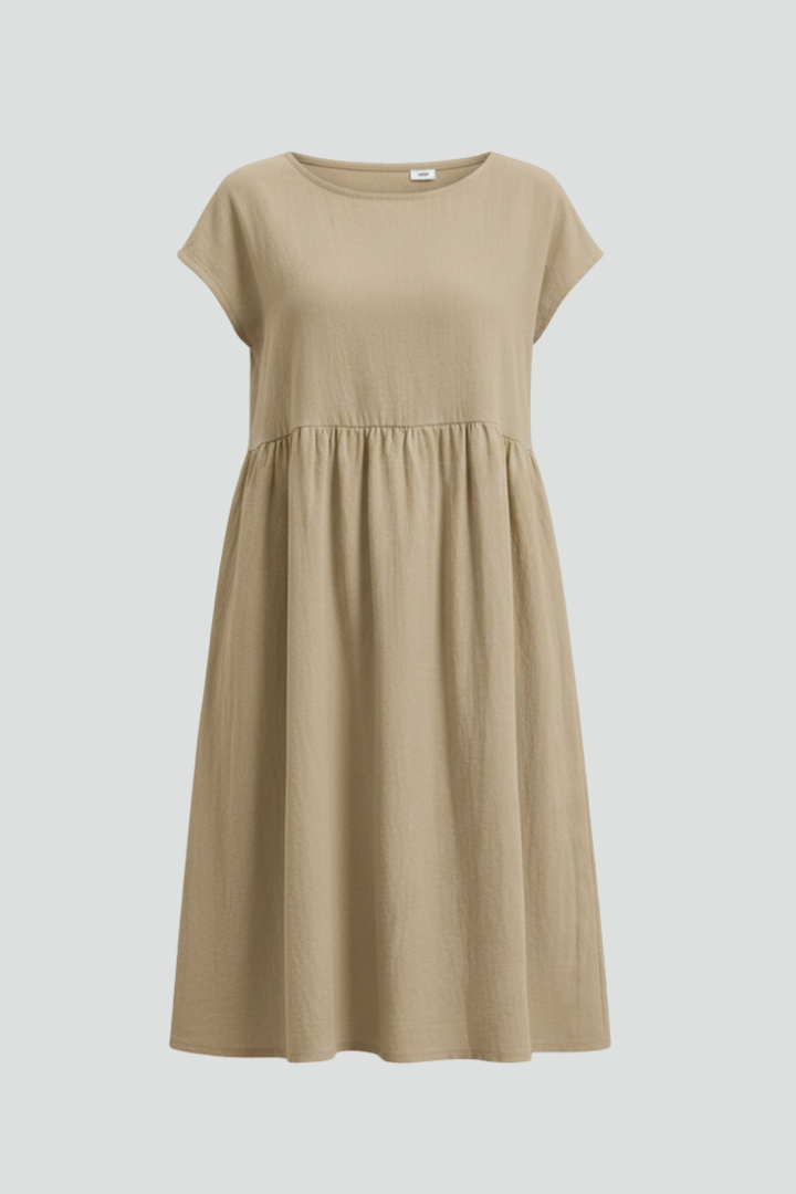 Women's relaxed fit knee-length casual dress with convenient pockets, perfect for everyday wear.
