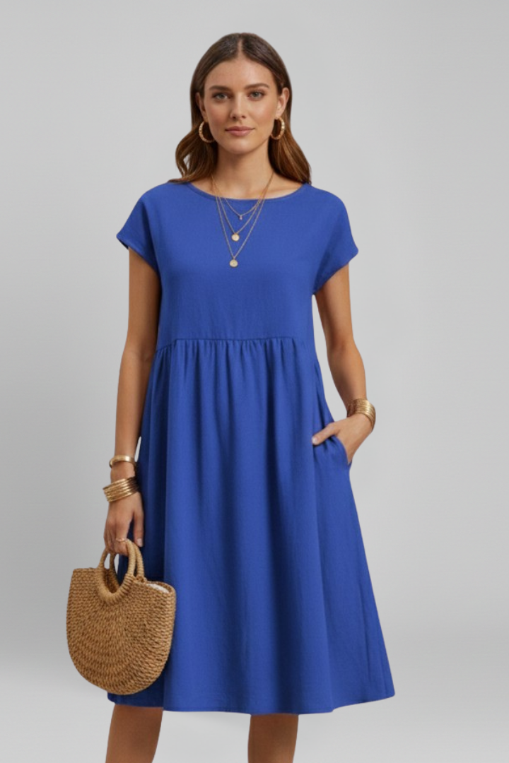 Women's relaxed fit knee-length casual dress with practical pockets, ideal for spring & summer.