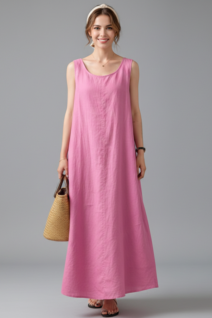 Relaxed fit women's knee-length dress with pockets, ideal for summer, short sleeves, and round neck.