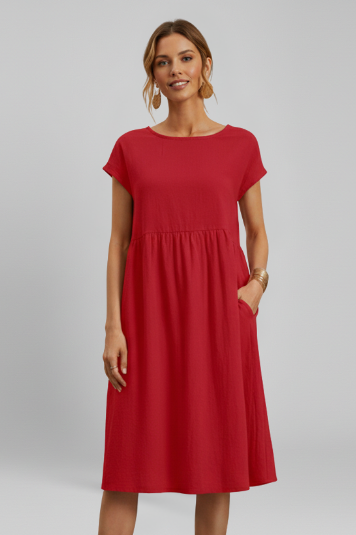 Versatile women's knee-length dress, relaxed fit, short sleeve, round neck, with practical pockets.