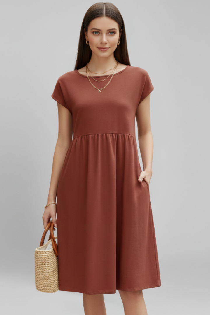 Everyday women's spring dress, knee-length, relaxed fit, with short sleeves, round neck, and handy pockets.