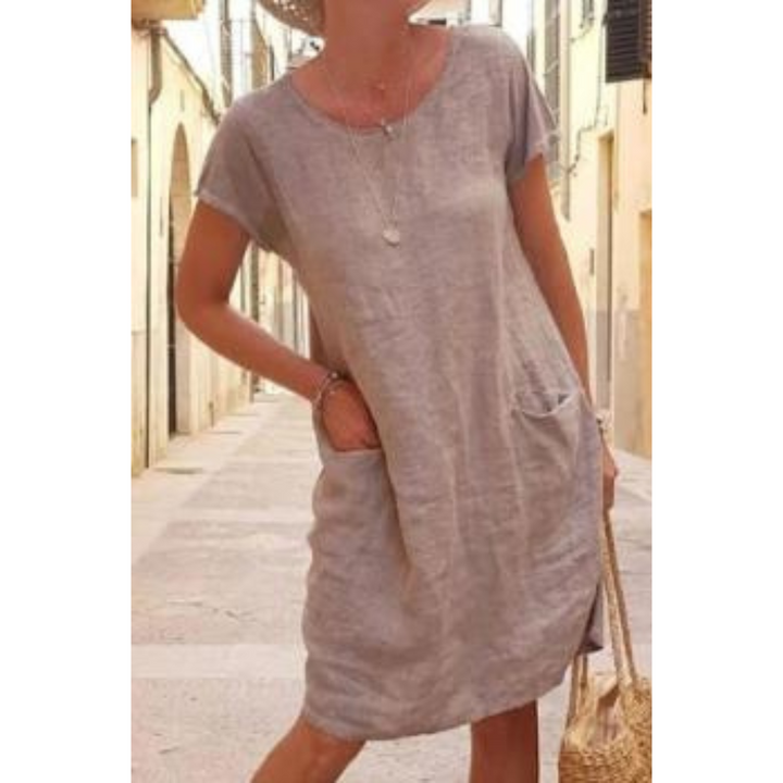 Women's relaxed fit knee-length t-shirt dress with short sleeves, perfect for casual summer wear.