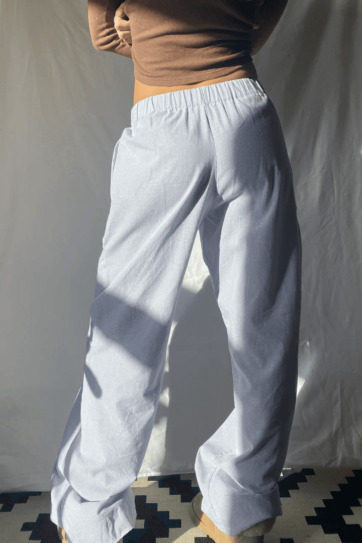 Comfortable women's relaxed fit lounge trousers, lightweight soft fabric & elastic waist for everyday wear.