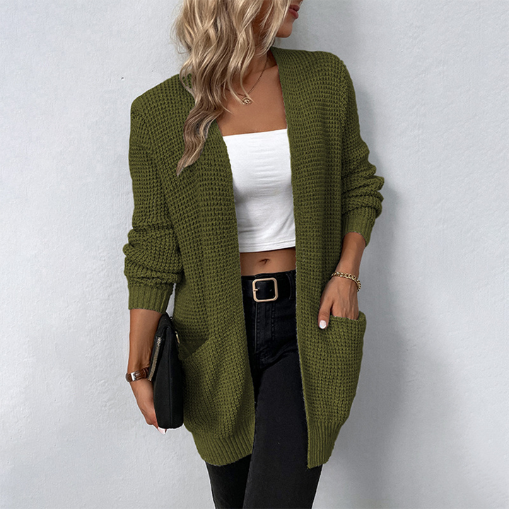 Women's relaxed fit long pocket winter cardigan in chunky knit, ideal for casual outerwear.