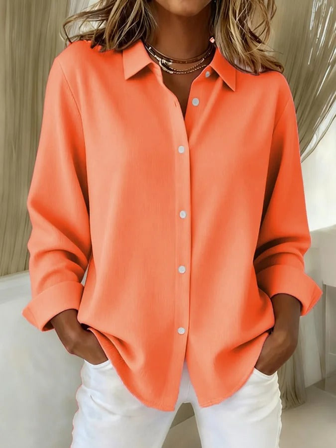 Comfortable relaxed fit women's long sleeve blouse. Versatile button down top for work or leisure.