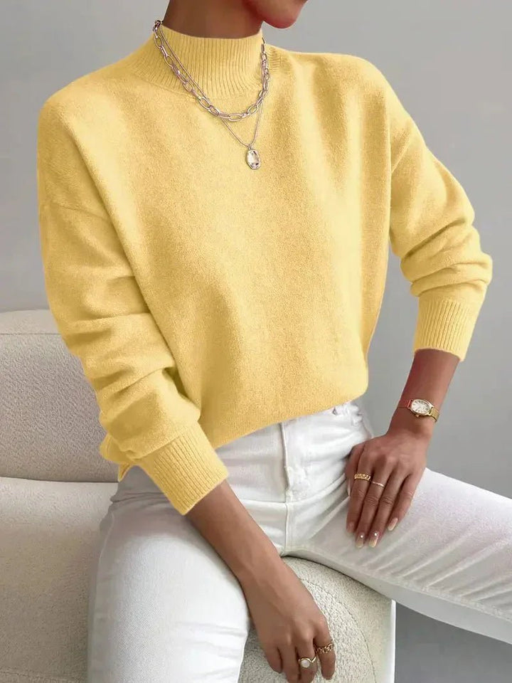 Versatile women's mock turtleneck long sleeve sweater, relaxed fit for spring, autumn, or winter.
