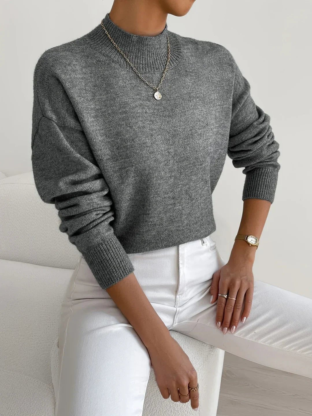Stylish women's relaxed fit mock turtleneck long sleeve sweater, smart casual and comfortable for any occasion.