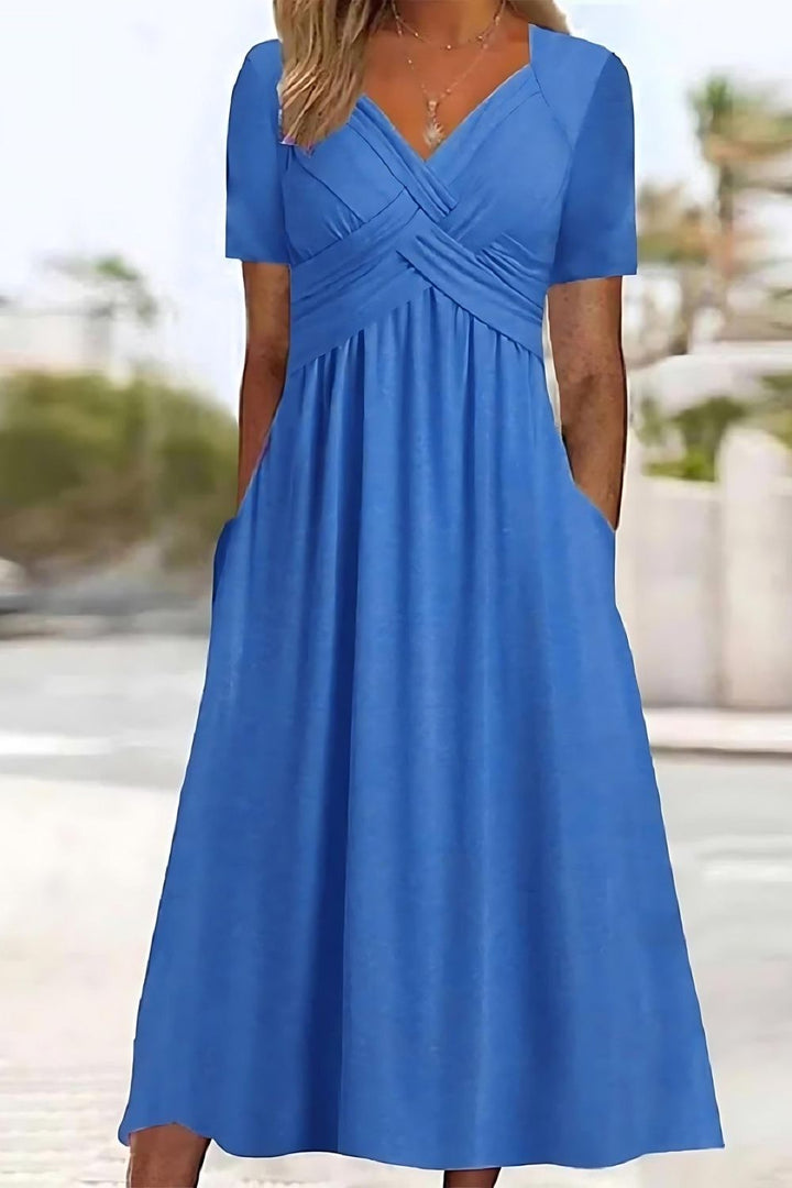 Women's relaxed fit printed midi dress, perfect for casual everyday wear. Comfortable and stylish summer/spring fashion.