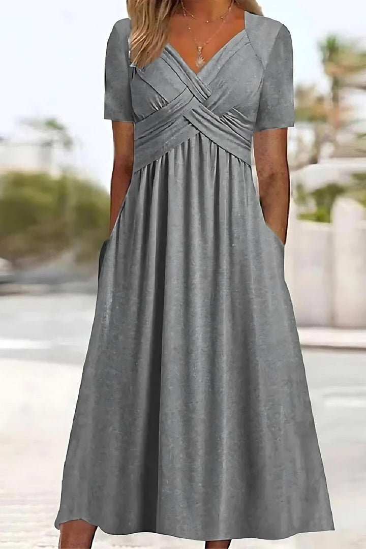 Flowy printed midi dress for women, relaxed fit, ideal for comfortable and stylish everyday wear or summer outfits.