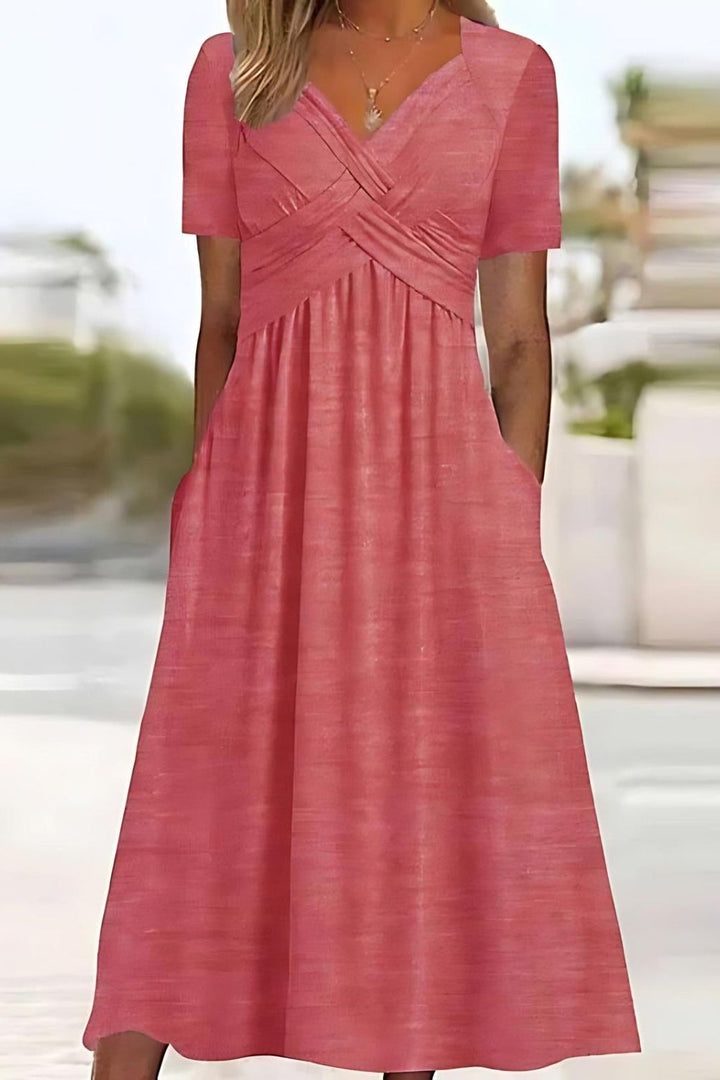 Stylish women's printed midi dress, relaxed fit, great for spring, summer, and casual everyday fashion. Easy care.