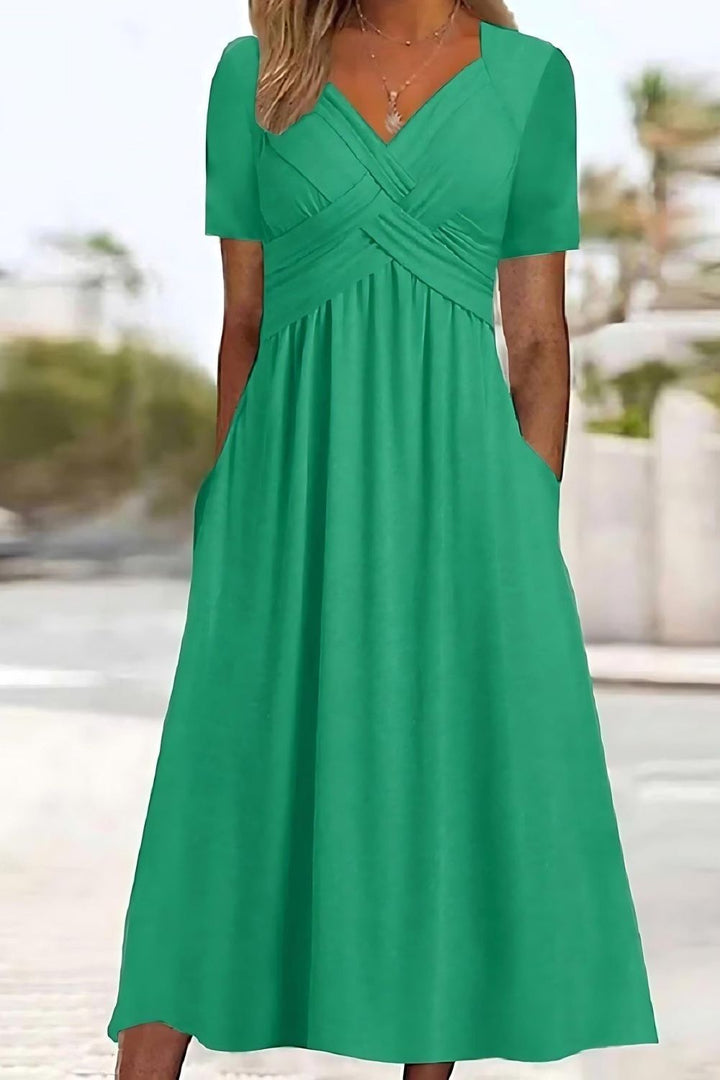 Women's casual relaxed fit midi dress with vibrant print, perfect for comfortable everyday style and summer fashion.