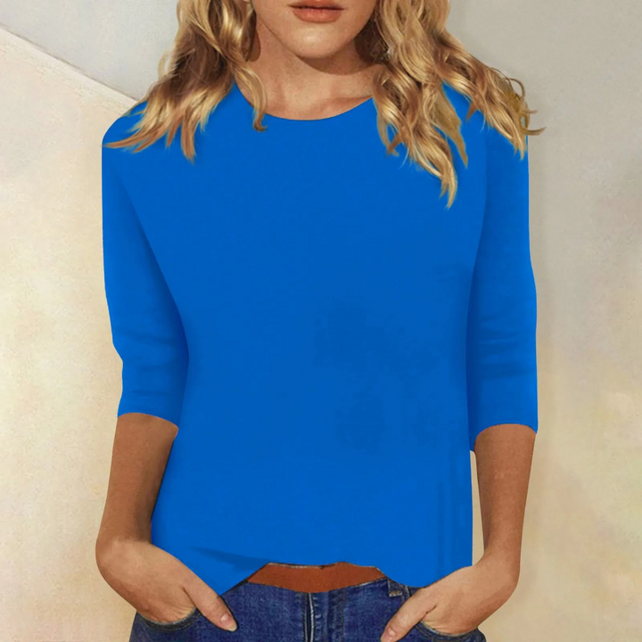 Sky blue women's comfortable relaxed fit top. Round neck & 3/4 sleeves, ideal for everyday casual style.