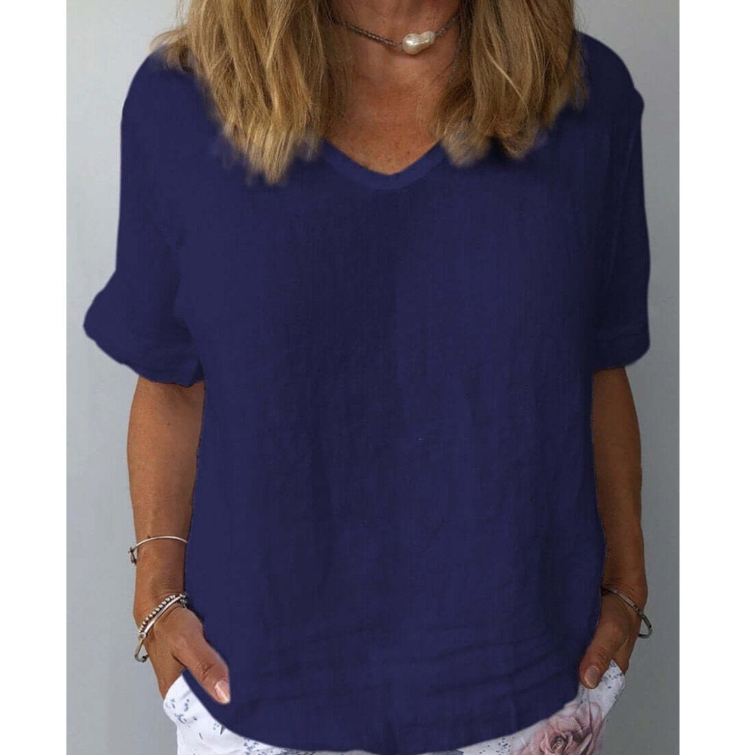 Stylish women's short sleeve V-neck top, with a relaxed fit for everyday fashion.
