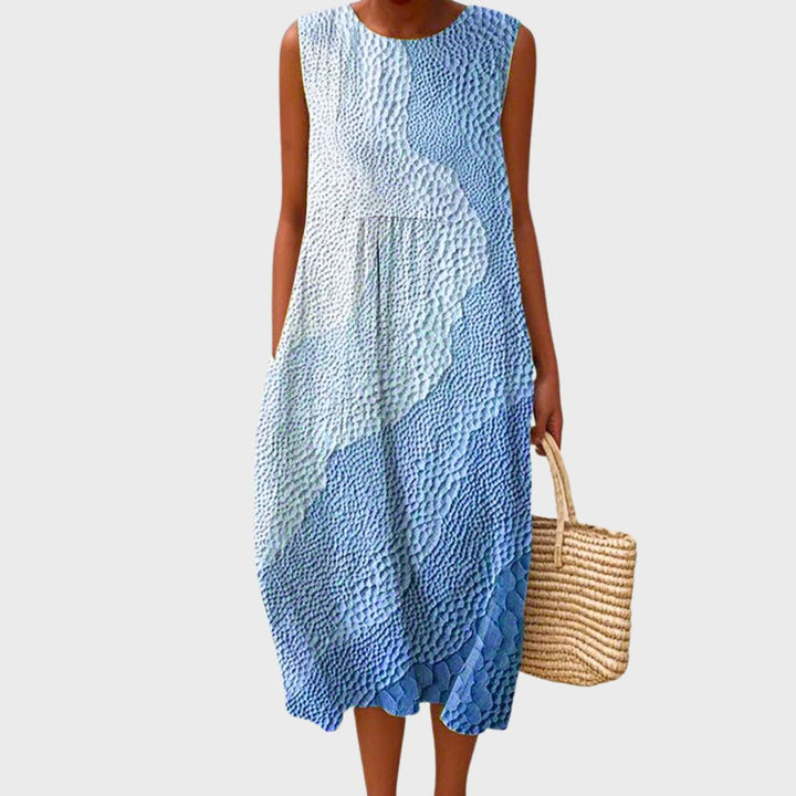 Comfortable women's summer sleeveless dress, relaxed knee-length fit for casual everyday wear.