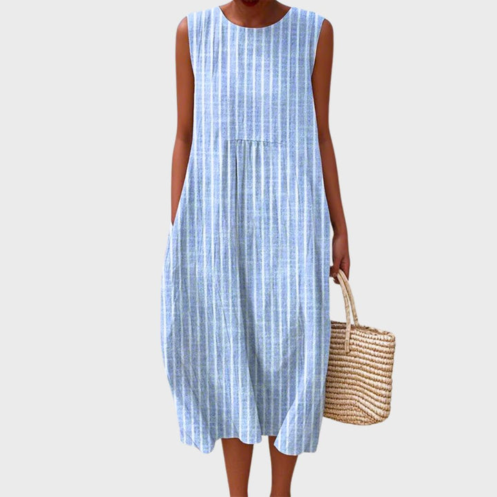 Effortless women's casual sleeveless dress, knee-length & relaxed fit, perfect for everyday style.