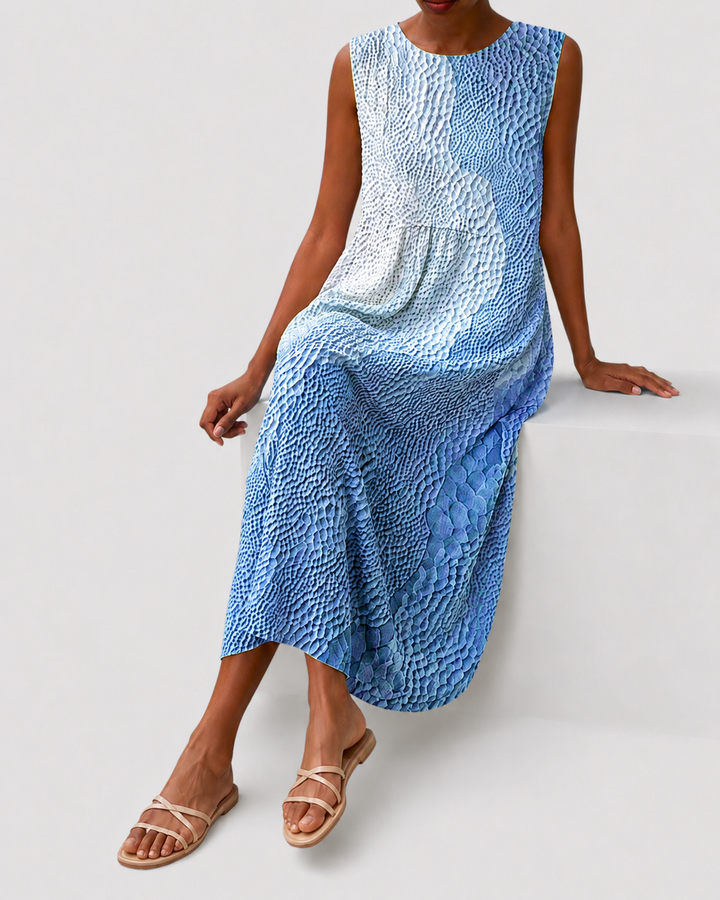 Simple women's knee-length sleeveless dress, relaxed fit, ideal for casual and comfortable everyday wear.