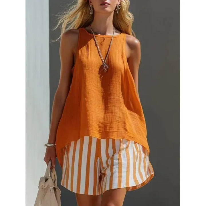 Striped sleeveless tank top & matching shorts, a chic women's two-piece set for beach, vacation, or summer fashion.